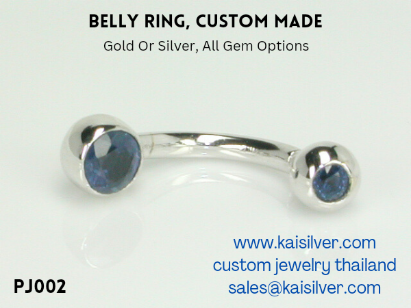 gold belly ring with sapphire gemstones
